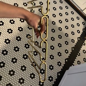 gold wine glass under counter holder. Solid metal antique